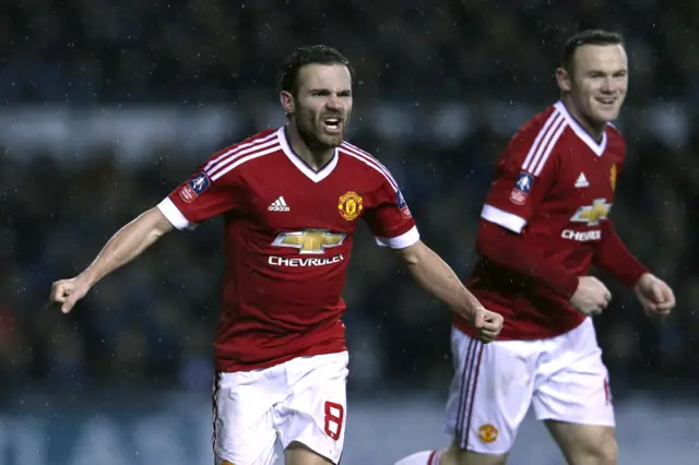 Juan Mata celebrates