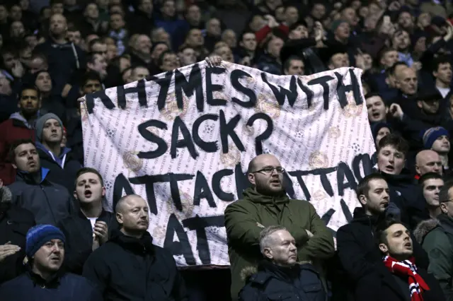 Manchester United fans with a banner