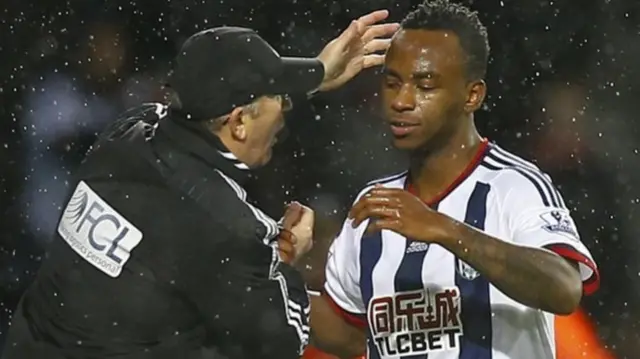 Tony Pulis moves to pat Saido Berahino on the back