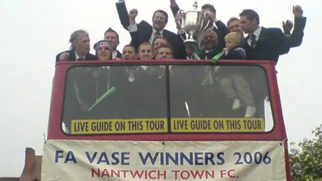 The team celebrating on their open top bus in 2006