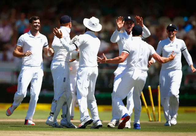 England celebrate taking their first wicket of the innings