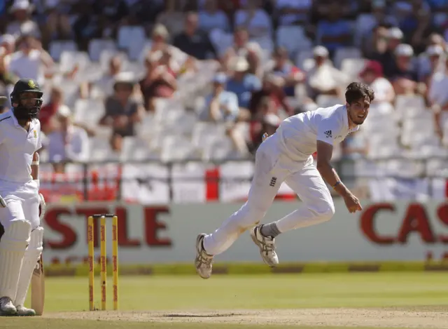 Steven Finn bowls