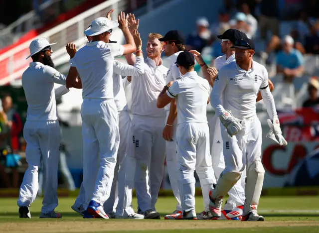 England celebrate taking the second wicket