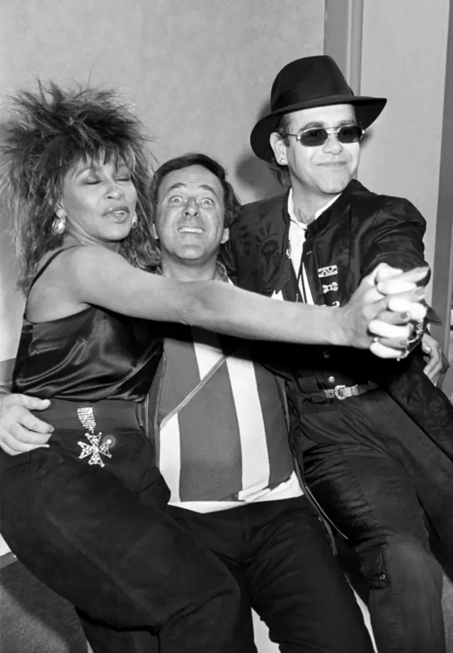 Sir Terry Wogan with his chatshow guests Tina Turner and Elton John in 1985