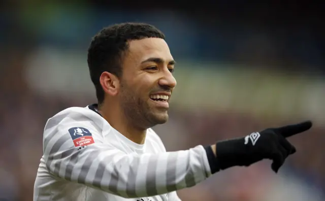 Aaron Lennon celebrates scoring the second goal for Everton