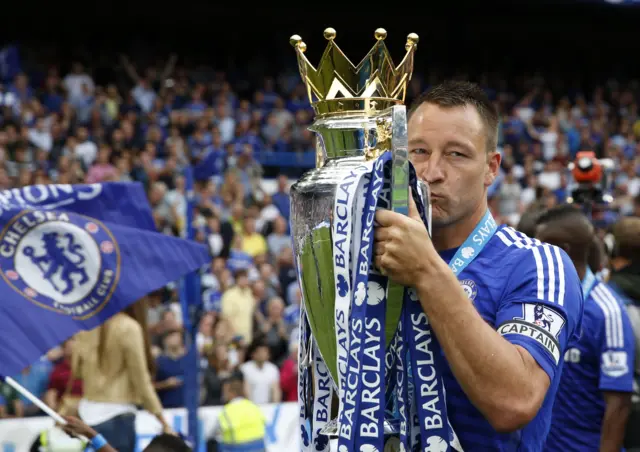 John Terry lifts the Premier League trophy