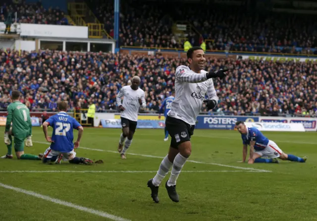 Everton"s Aaron Lennon celebrates scoring his side"s second goal of the game during the Emirates FA Cup, fourth round match at Brunton Park, Carlisle