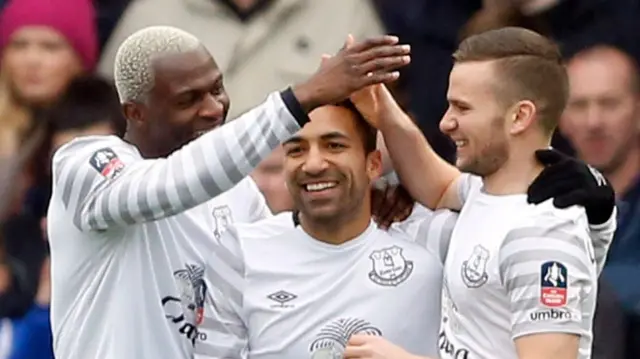 Arouna Kone celebrates scoring the first goal for Everton with Aaron Lennon and Tom Cleverley