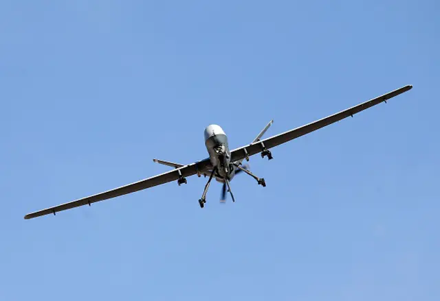 An MQ-9 Reaper remotely piloted aircraft (RPA) flies by during a training mission at Creech Air Force Base on November 17, 2015 in Indian Springs, Nevada.