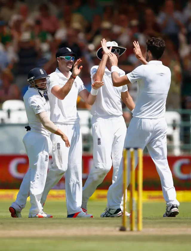 James Anderson and Steven Finn celebrate