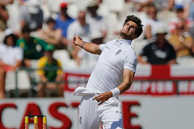 Steven Finn bowls for England