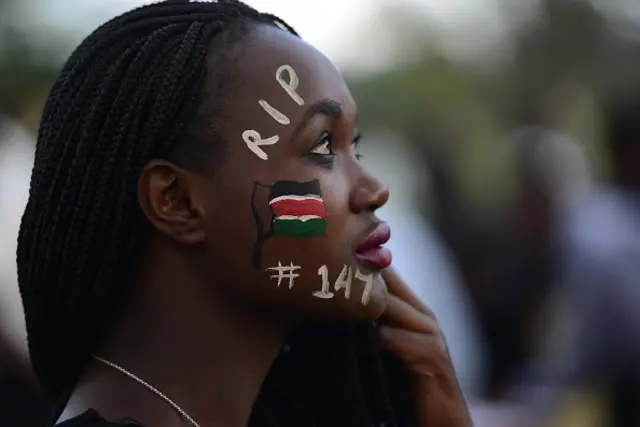 A woman attends a Musical concert in honour of the victims of the attack on Garissa University College in downtown Nairobi on April 14, 2015