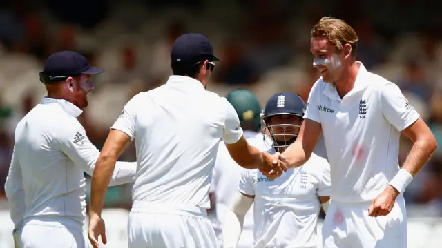 Stuart Broad and Alastair Cook shake hands