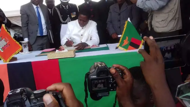 Edgar Lungu signing constitution into law