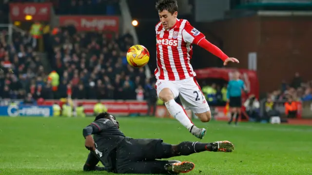 Bojan Krkic avoids a challenge from Kolo Toure