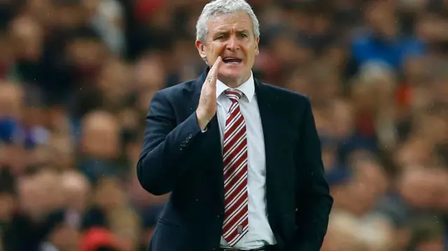 Mark Hughes instructs