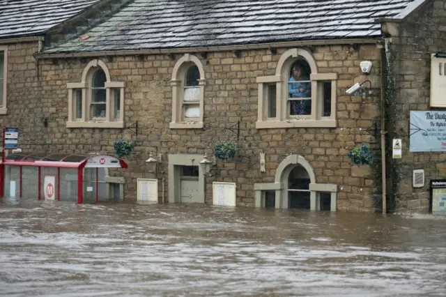 Flooding in the West Yorkshire village of Mytholmroyd