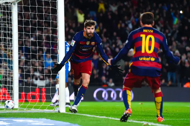 Gerard Pique celebrates