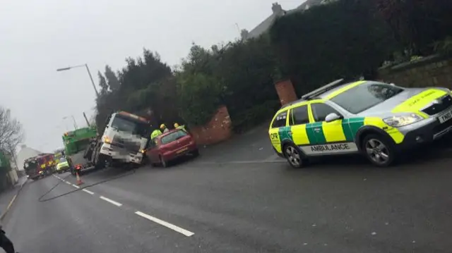 Hednesford road closed as lorry loses load and ends up in garden