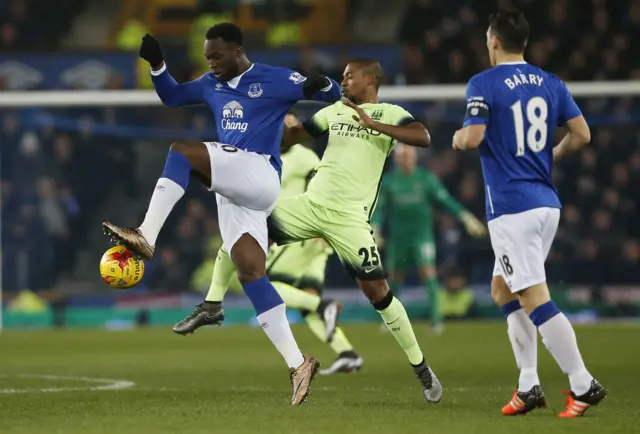 Romelu Lukaku battles for the ball