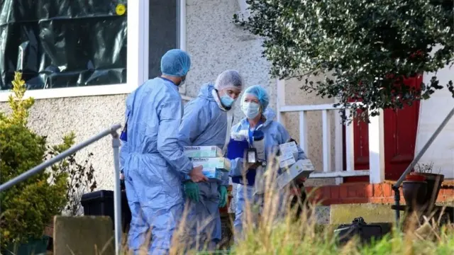 Forensic teams at Erith house