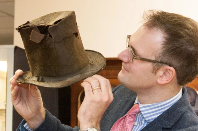 Top hat found wedged inside an attic fireplace at a Georgian farmhouse in Derbyshire.