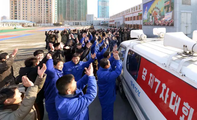 In this photograph released by North Korea"s official Korean Central News Agency (KCNA) on January 6, 2016, North Korean people celebrate the alleged success of the first hydrogen bomb test in Pyongyang