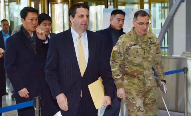 US Ambassador to South Korea Mark Lippert (C) and US General Curtis Scaparrotti (R), Commander of the US Forces Korea, arrive to meet with South Korean Foreign Minister Yun Byung-Se following North Korea"s hydrogen bomb test at the Foreign Ministry in Seoul on 6 January 2016.