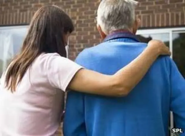 Carer with elderly man