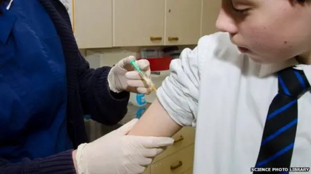 Boy getting vaccination