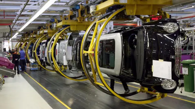 Mini cars on production line