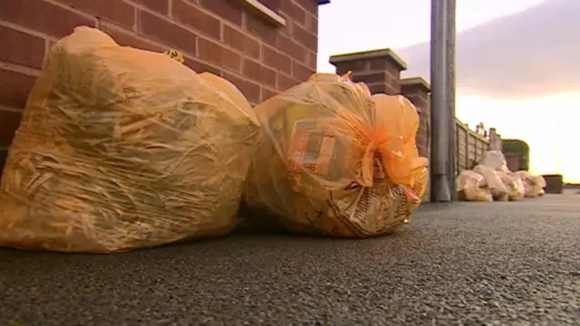 Recycling bags in the street