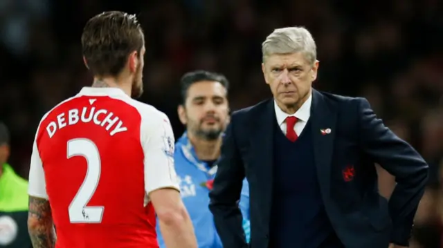 Mathieu Debuchy and Arsene Wenger