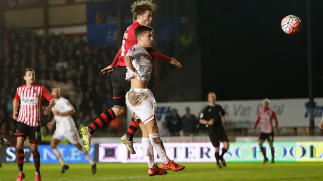 Christian Ribeiro heads at goal