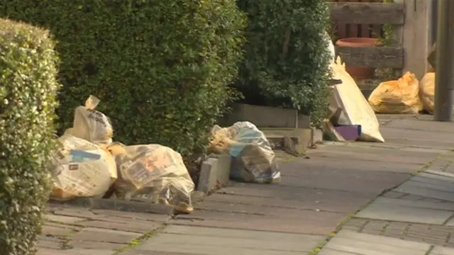 Recycling bags in the street