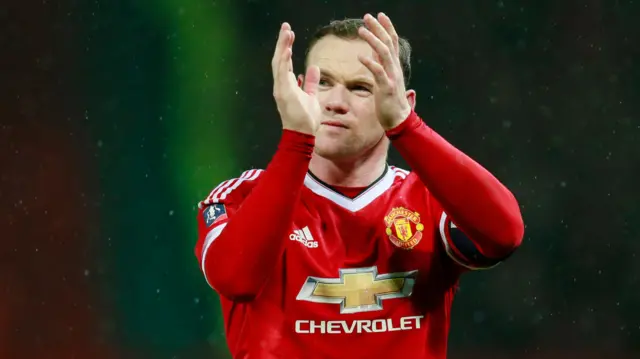 Wayne Rooney applauds