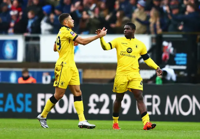 Micah Richards and Rudy Gestede celebrate