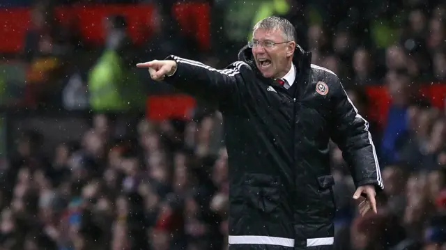 Nigel Adkins instructs