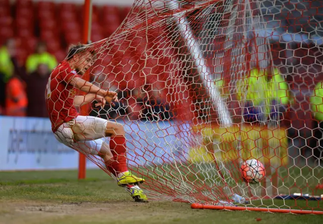 Jamie Ward gets tangled in the net