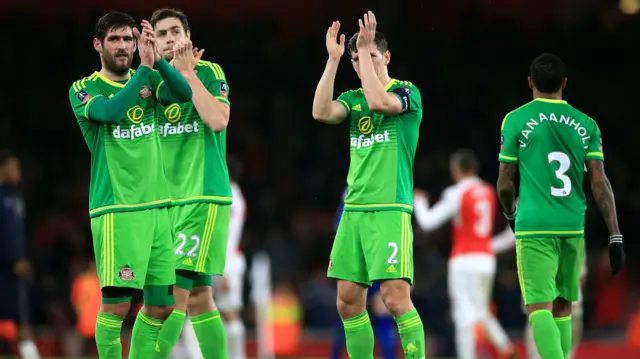 Sunderland players applaud at full-time