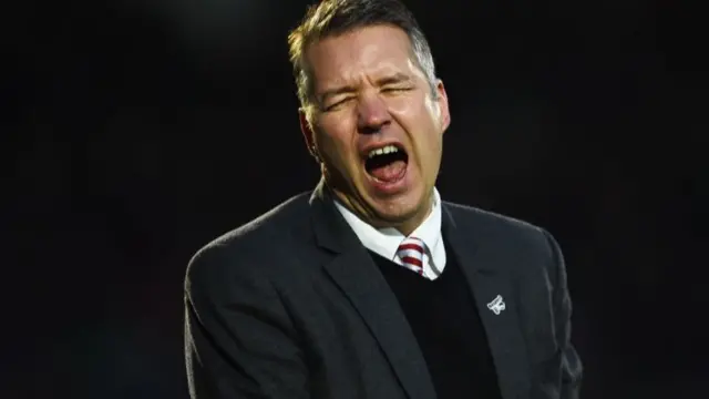 Darren Ferguson reacts