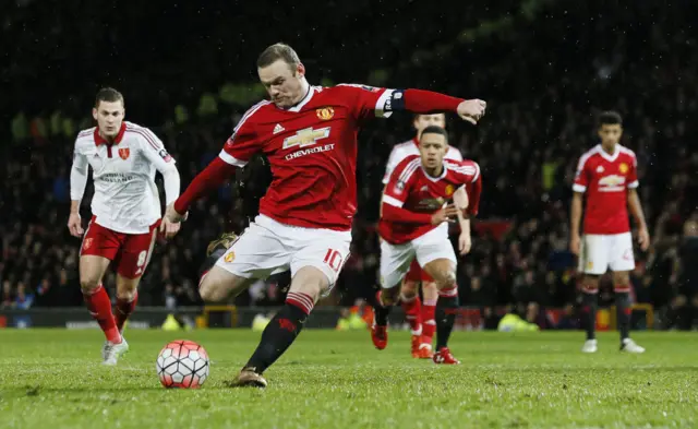 Wayne Rooney takes a penalty