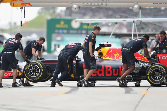 Red Bull is pushed back into the garage