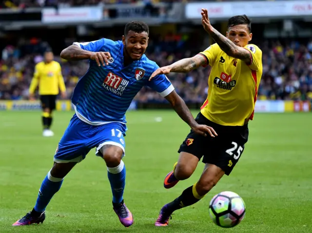 Josh King vies for the ball