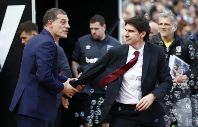 Slaven Bilic shakes hands with Middlesbrough manager Aitor Karanka