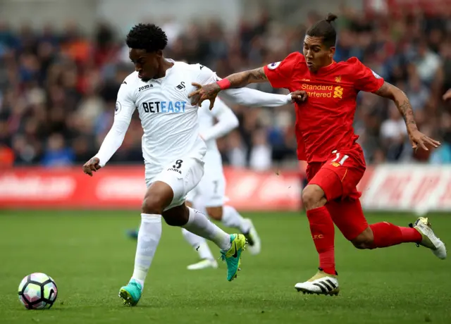 Leroy Fer and Roberto Firmino