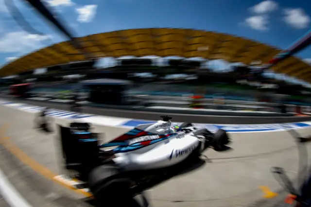 A Williams leaves the pit garage