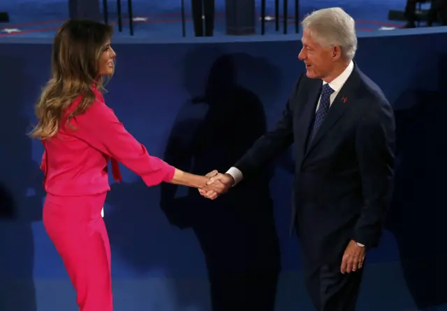 Former US President Bill Clinton greets Melania Trump before the start of the second U.S. presidential debate between Republican U.S. presidential nominee Donald Trump and Democratic U.S. presidential nominee Hillary Clinton at Washington University in St. Louis, Missouri.