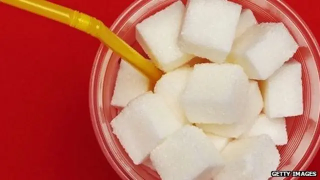 Sugar cubes in plastic cup