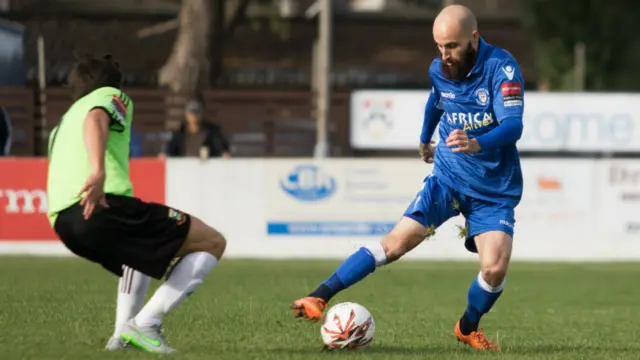 Chris Henderson in action for Lowestoft Town against Hendon